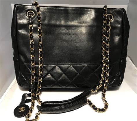 black chanel purse with chain strap|Chanel quilted handbag gold chain.